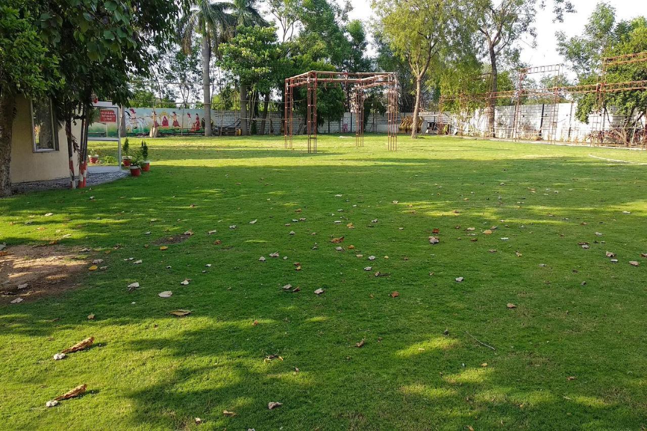 Oyo 14354 Amar Marriage Palace Hotel Dharmpura Buitenkant foto