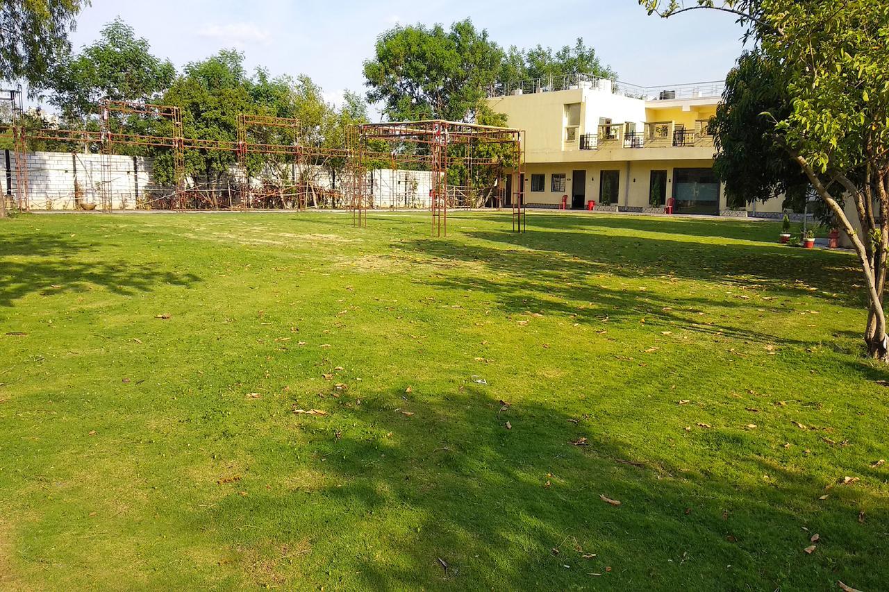 Oyo 14354 Amar Marriage Palace Hotel Dharmpura Buitenkant foto
